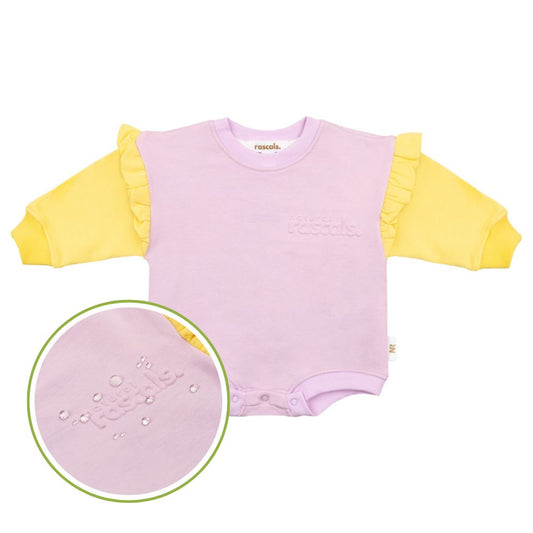 Two children wearing matching pastlel lavender and sunshine yellow baby, toddler rompers that are spill resistant by Natural Rascals