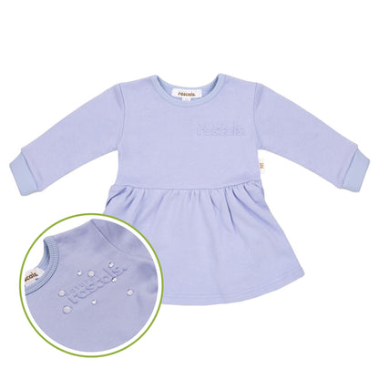 spill-resistant close-up of periwinkle lavender spill resistant baby toddler dress also showing the water beading by Natural Rascals.