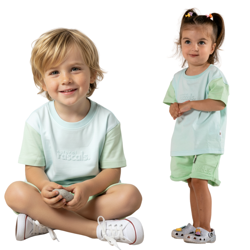 two children wearing matching clothes in airy blue and mint green spill-resistant baby toddler tee by Natural Rascals 